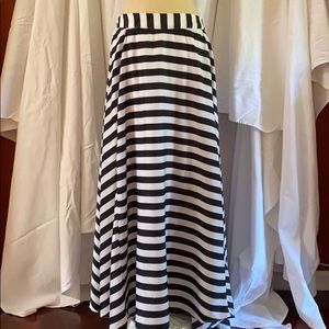 Long black and white striped skirt.